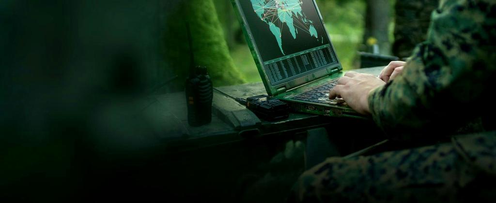 Soldier on computer analysing potential threats