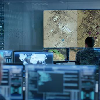Military man analysing satellite imagery for Intelligence operations