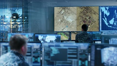Military man analysing satellite imagery for Intelligence operations