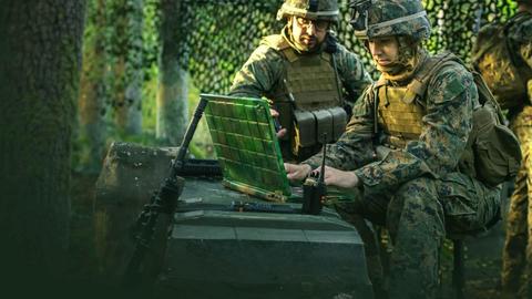 Soldiers on computers in military operations