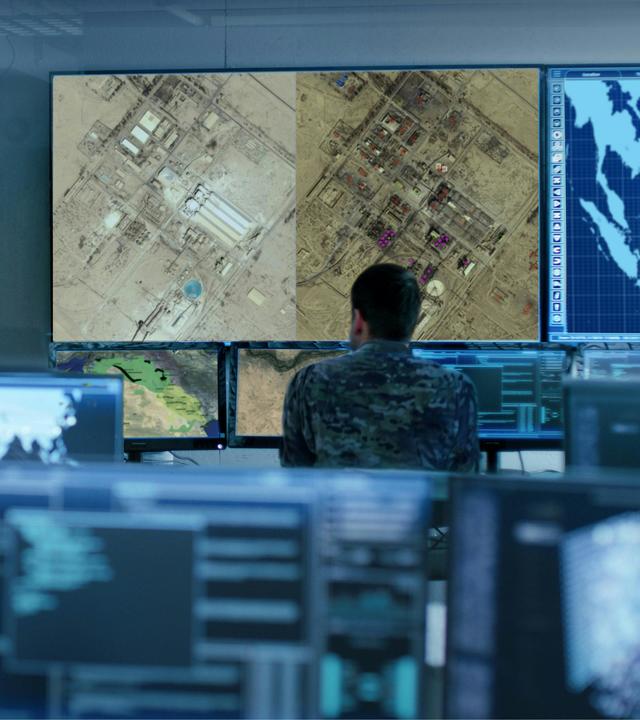 Operators screening a location evolution from 2 satellite images (before & after)