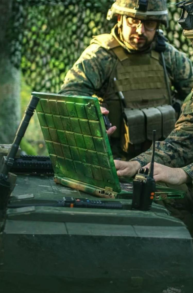 Soldiers on computers in military operations