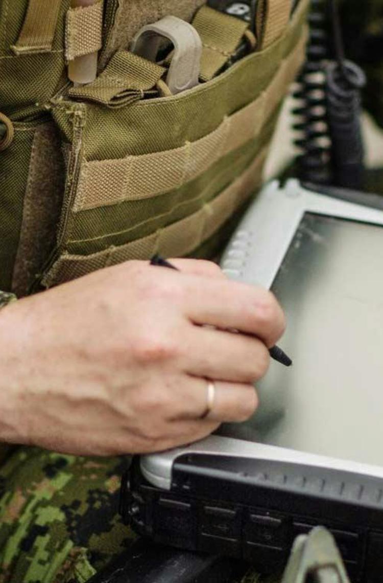 Military man using Emdyn for language barriers Military man using Emdyn for language barriers